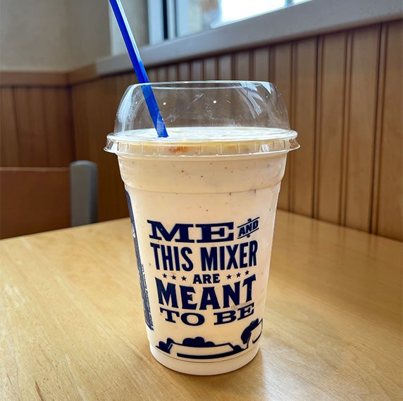 Medium Concrete Mixer sitting on a table.